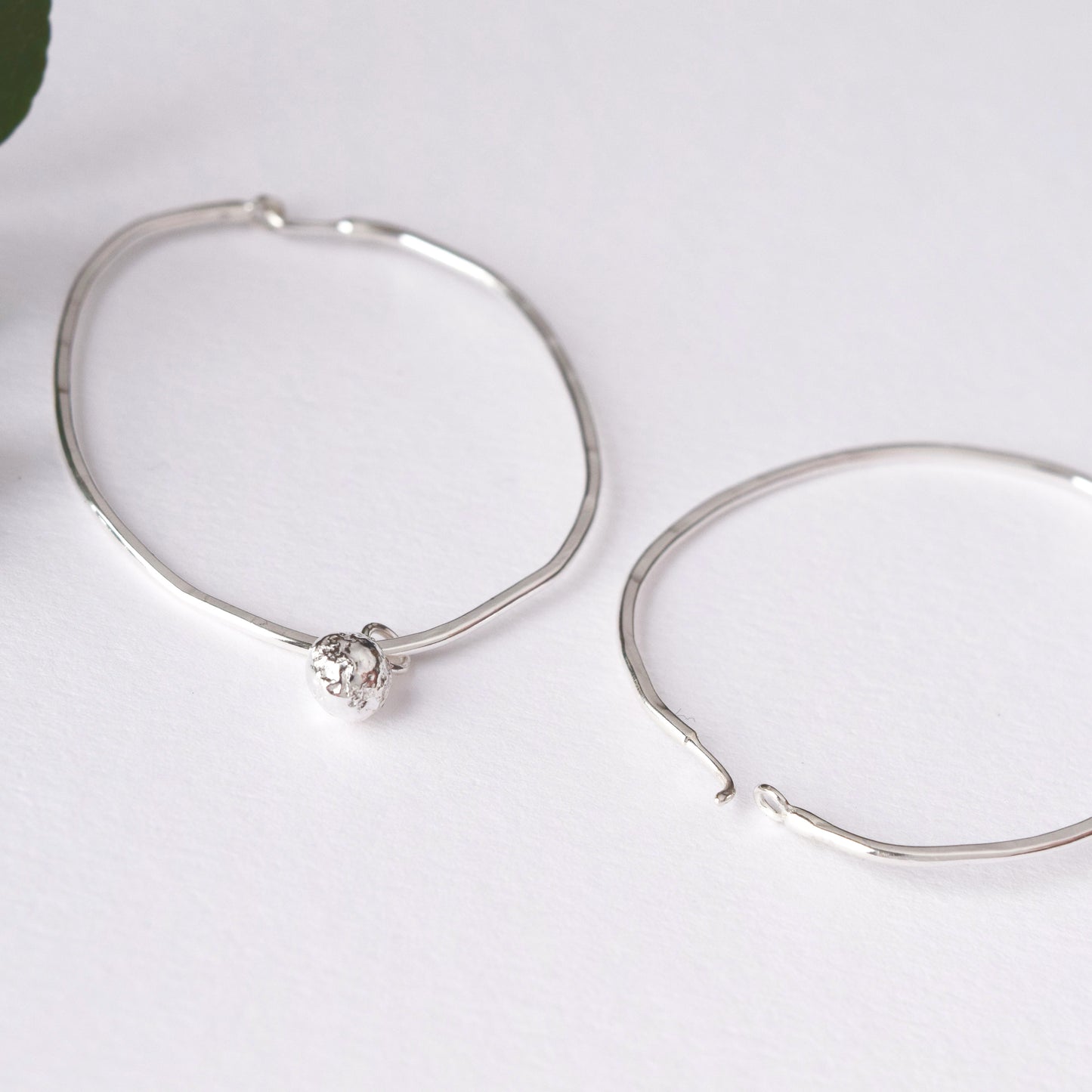 Handmade silver hoop earrings by MUKA studio