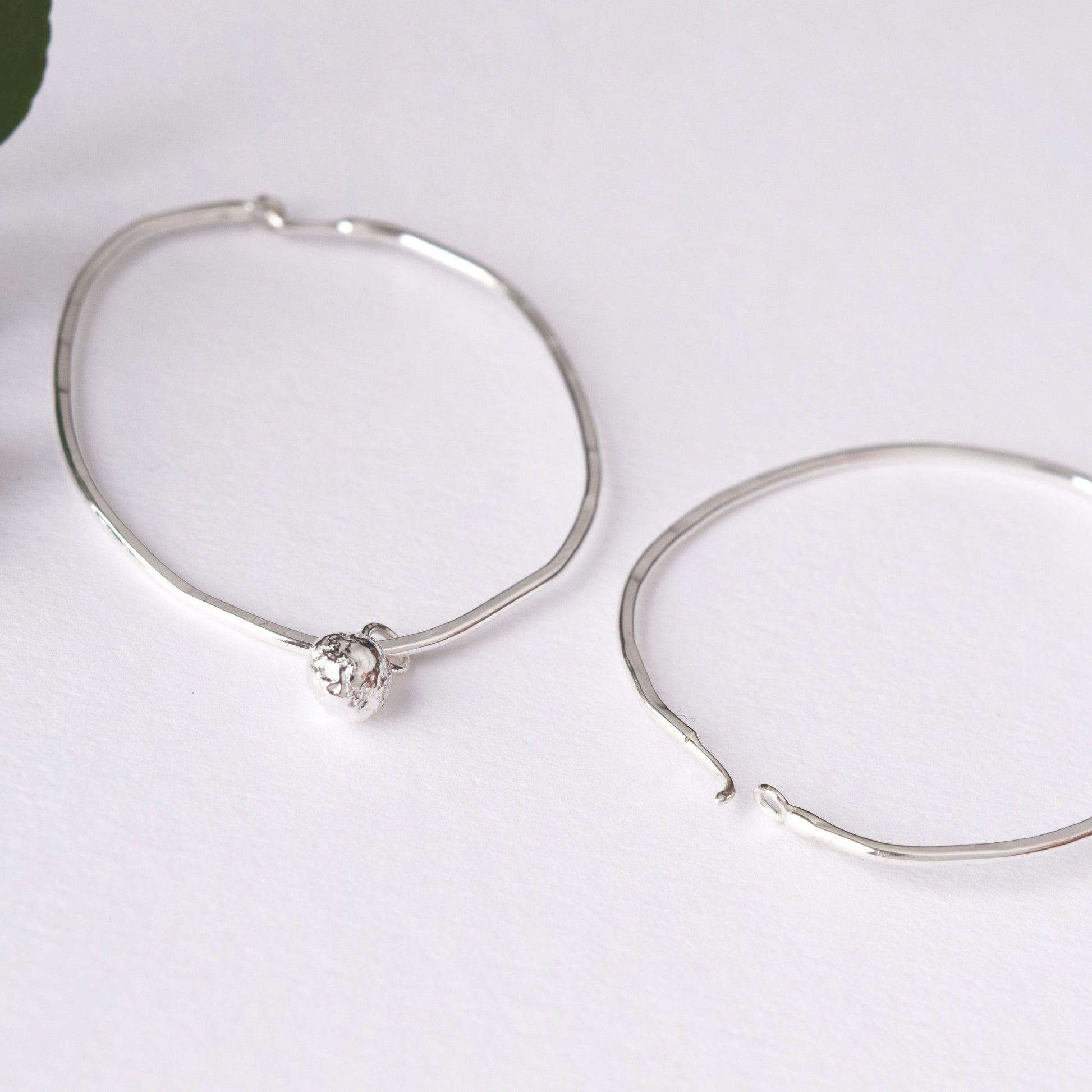 Handmade silver hoop earrings by MUKA studio