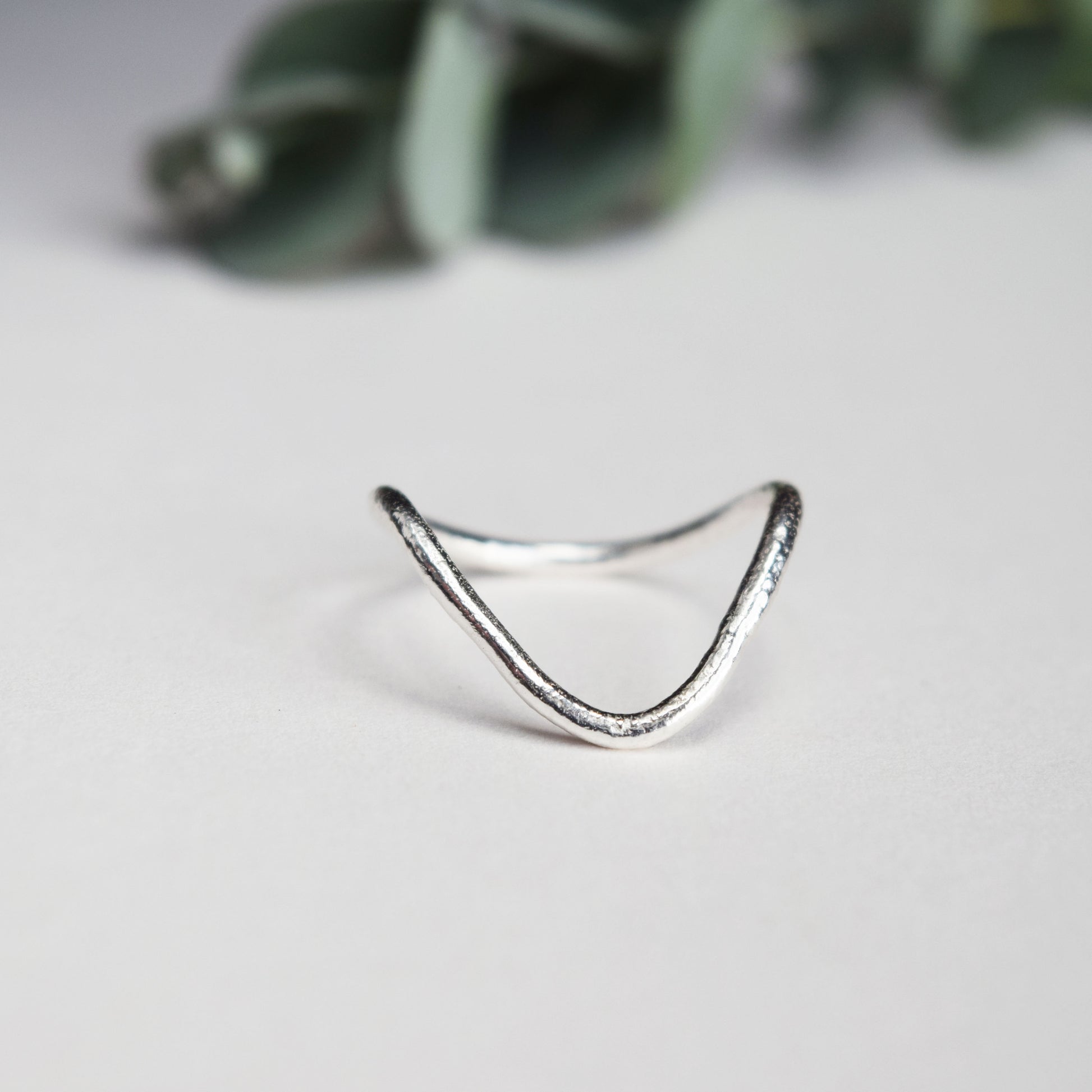 Deep V ring on white background