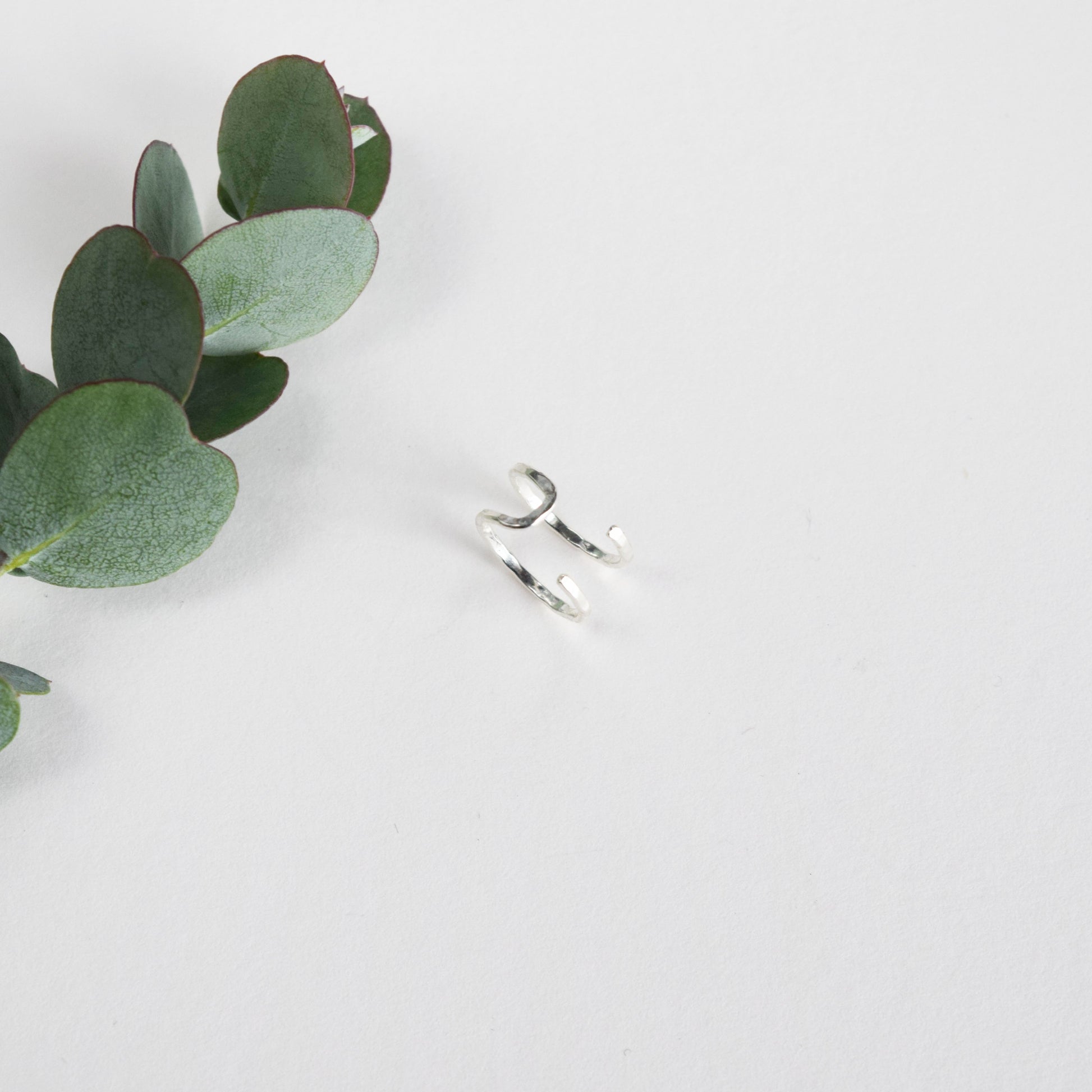 Double conch cuff on white background