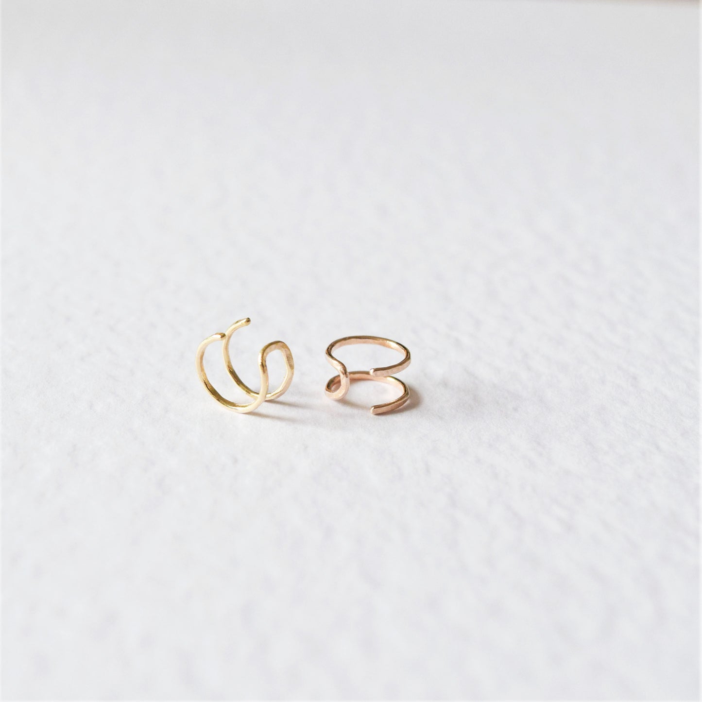 product image of double helix cuffs rose gold and gold