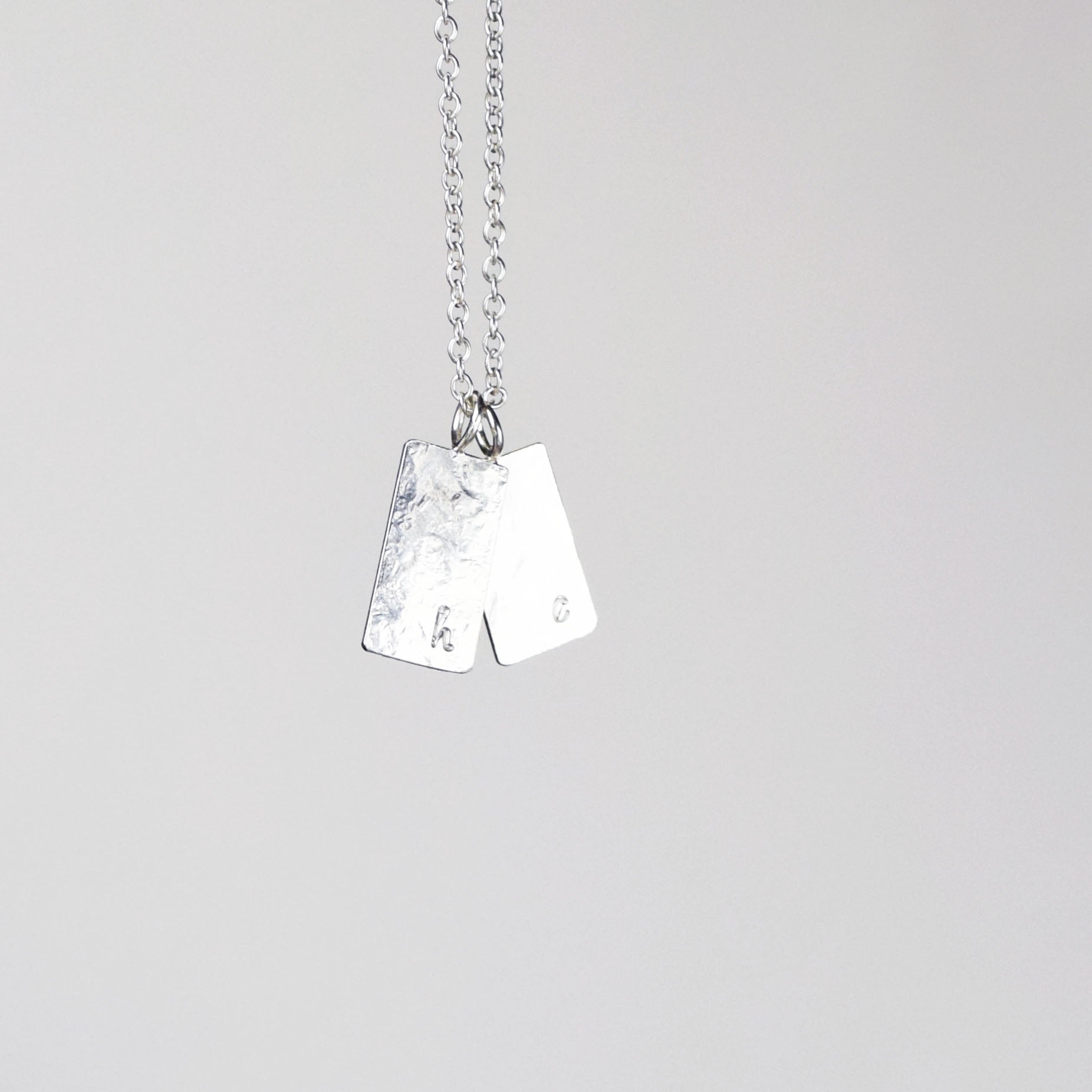 Personalised necklace with initials H and E