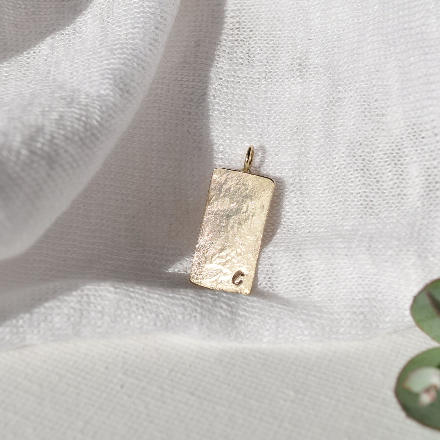 gold pendant personalised with letter C
