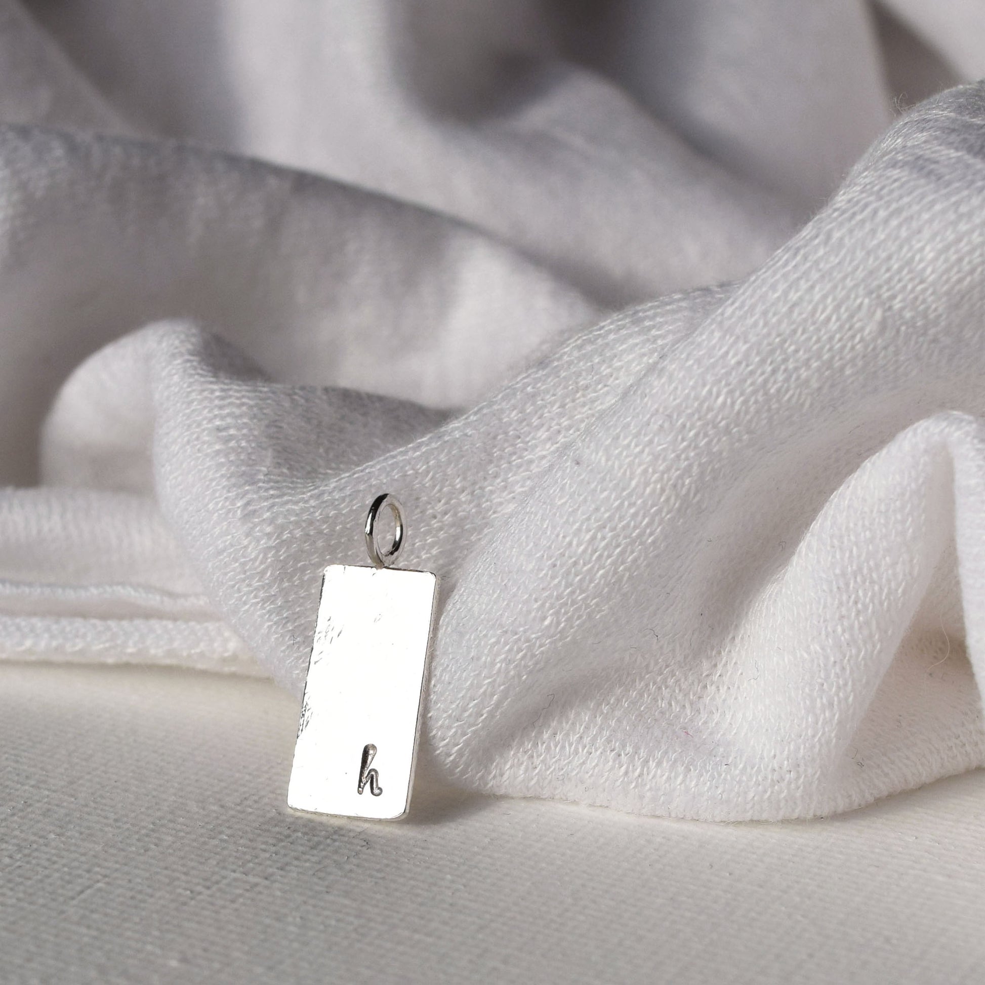 Silver pendant personlalised with letter H