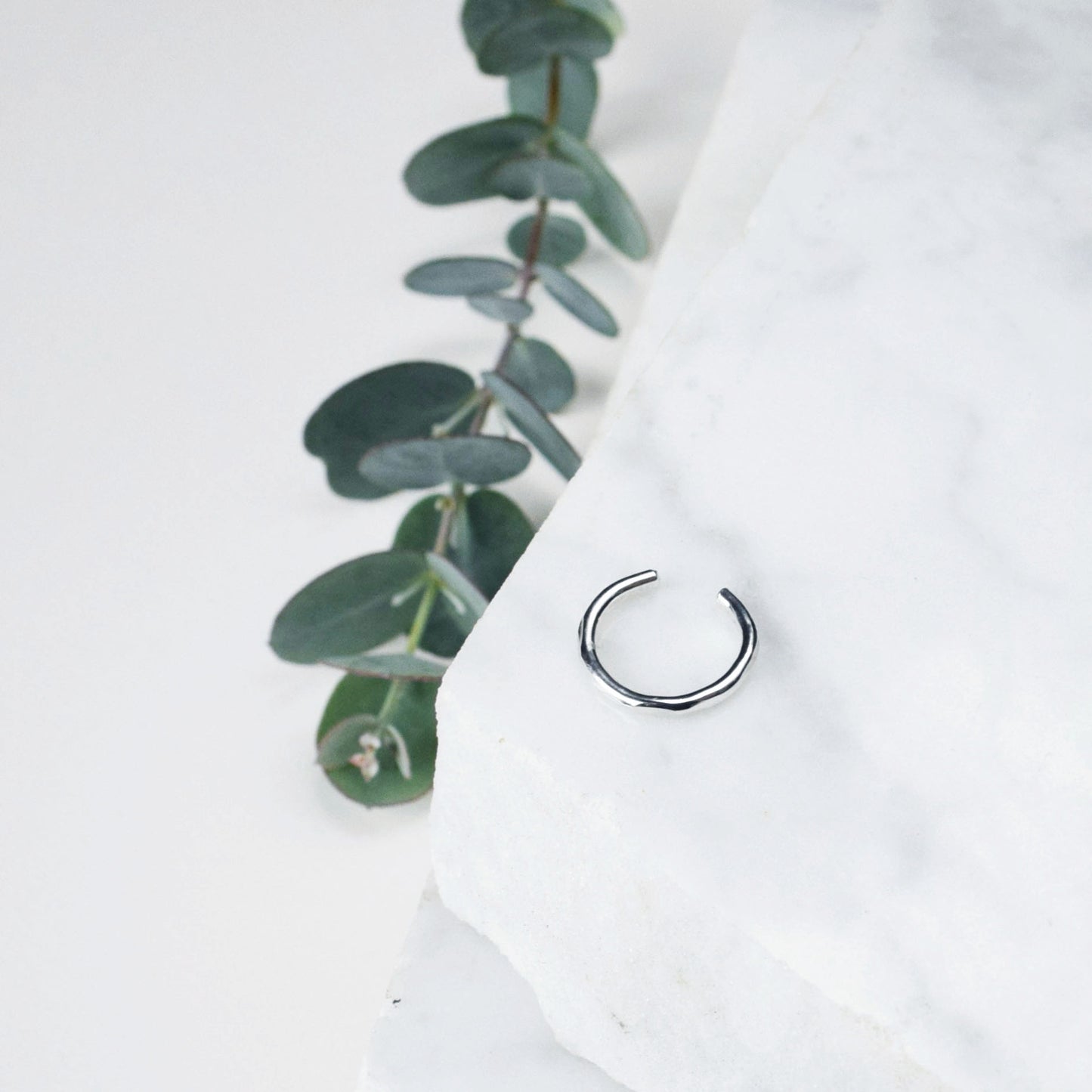 Product image of thick conch cuff 1.2mm thick hammered finish