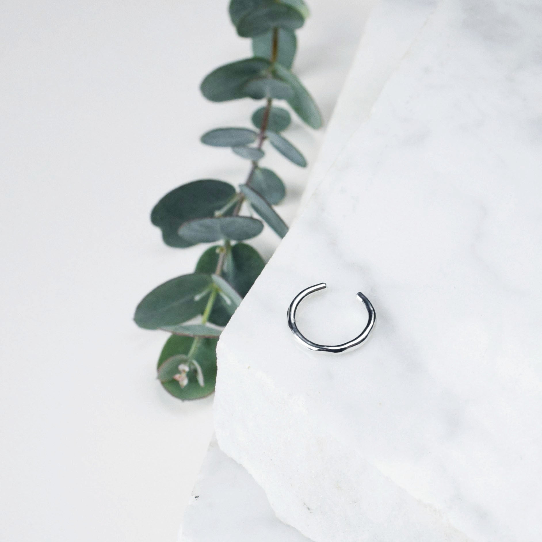 Product image of thick conch cuff 1.2mm thick hammered finish