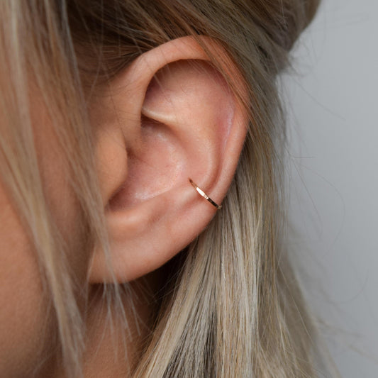 9ct rose gold ear cuff, conch cuff on model