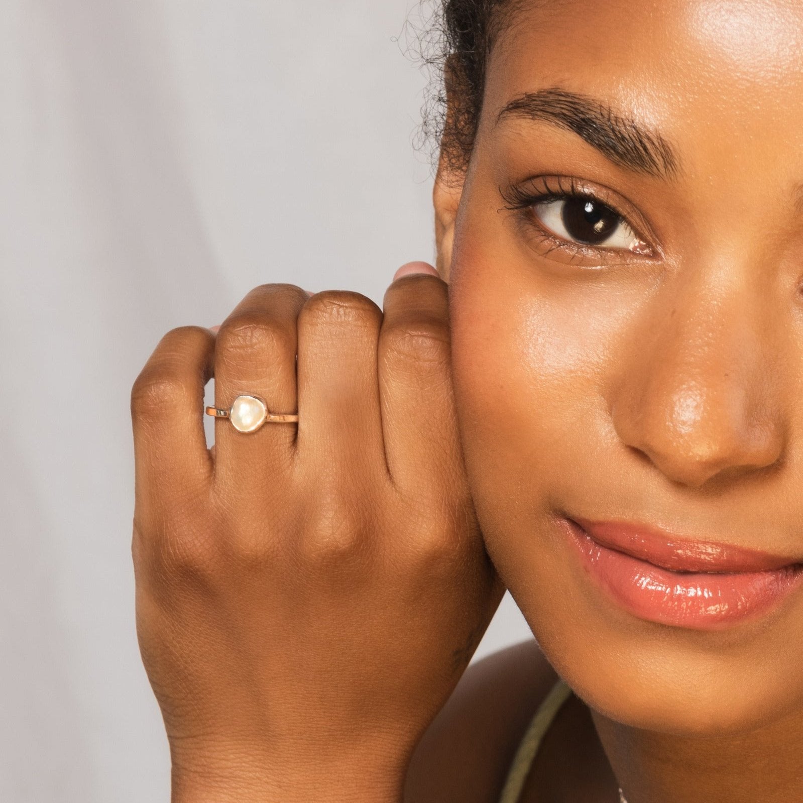 model wearing a recycled sterling silver and pearl ring