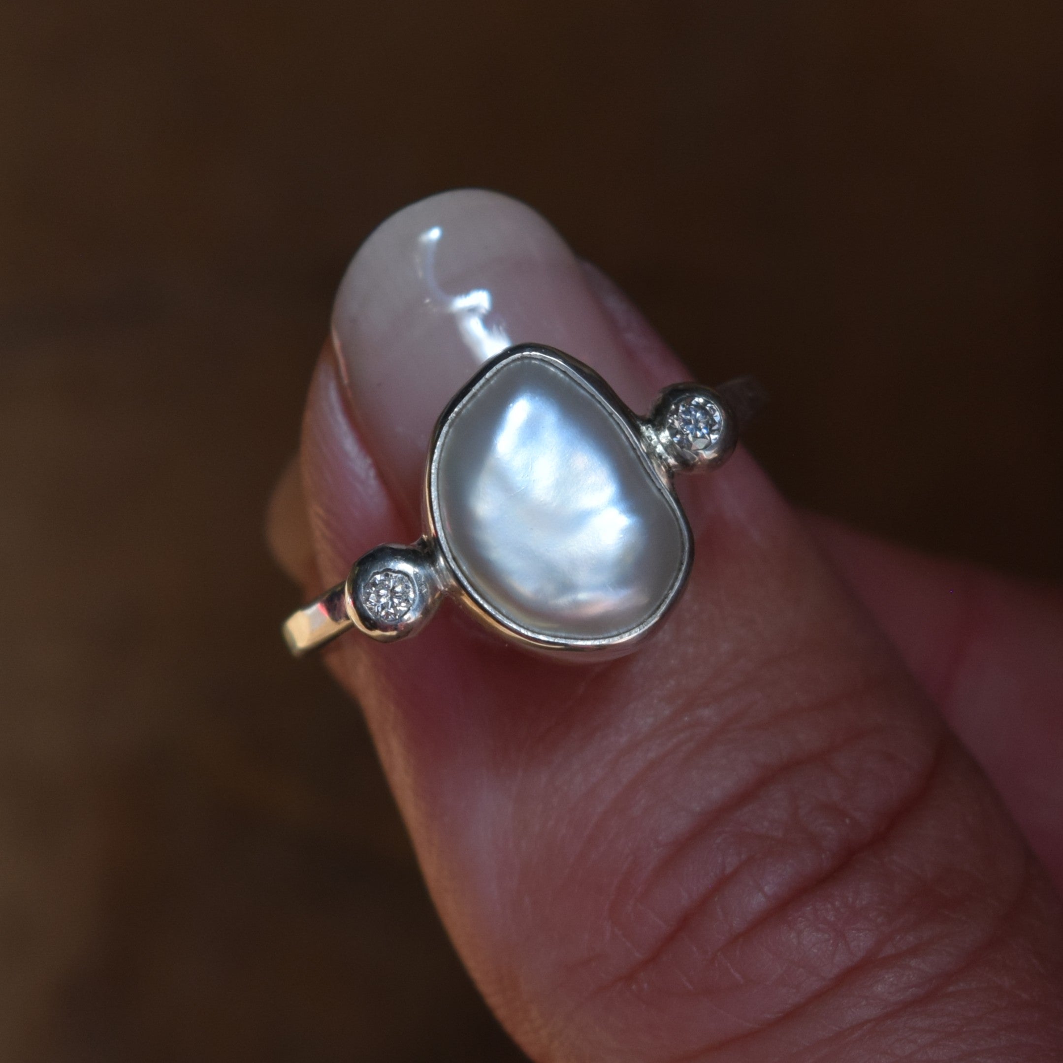 A natural keshi pearl and diamond ring set in recycled sterling silver, handmade in UK