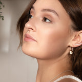 Silver and gold ear stacking with hoop earrings and ear climbers handmade in recycled silver