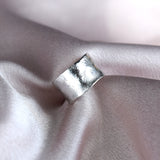 Silver ear cuff with molten texture handmade in recycled silver UK