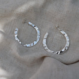 Statement hoop earrings hand-carved in recycled sterling silver