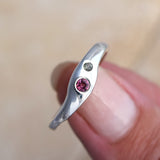 Pink tourmaline and green sapphire silver wave ring handmade in Scotland, UK