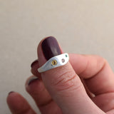 Recycled silver wave ring with citrine, pink sapphire and emerald stones set into the silver band. Colorful and fun ring handmade in UK