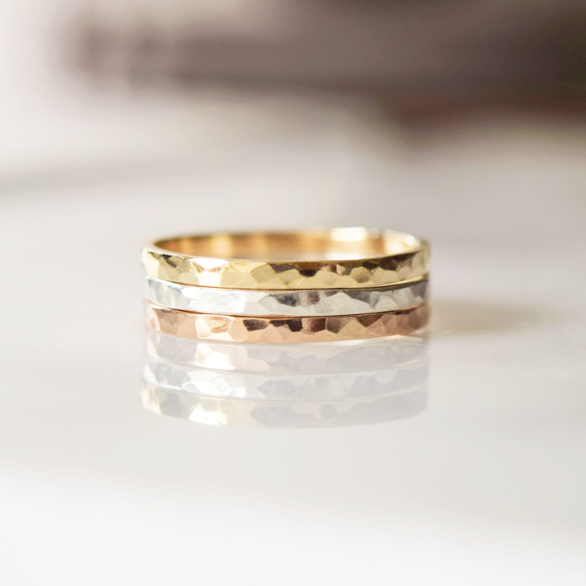 Trio of stacking rings on white background