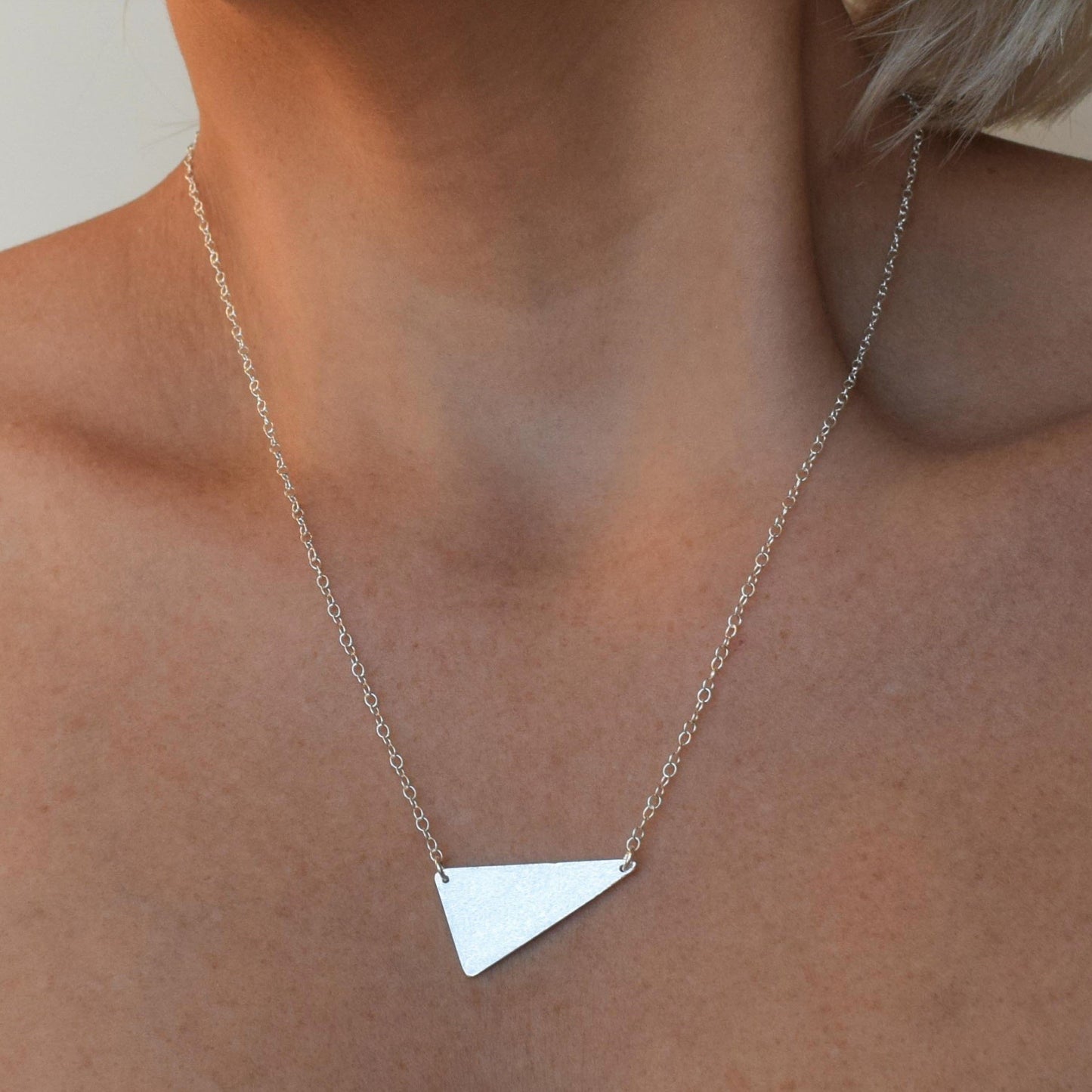 Geometric triangle necklace in sterling silver handmade by muka studio