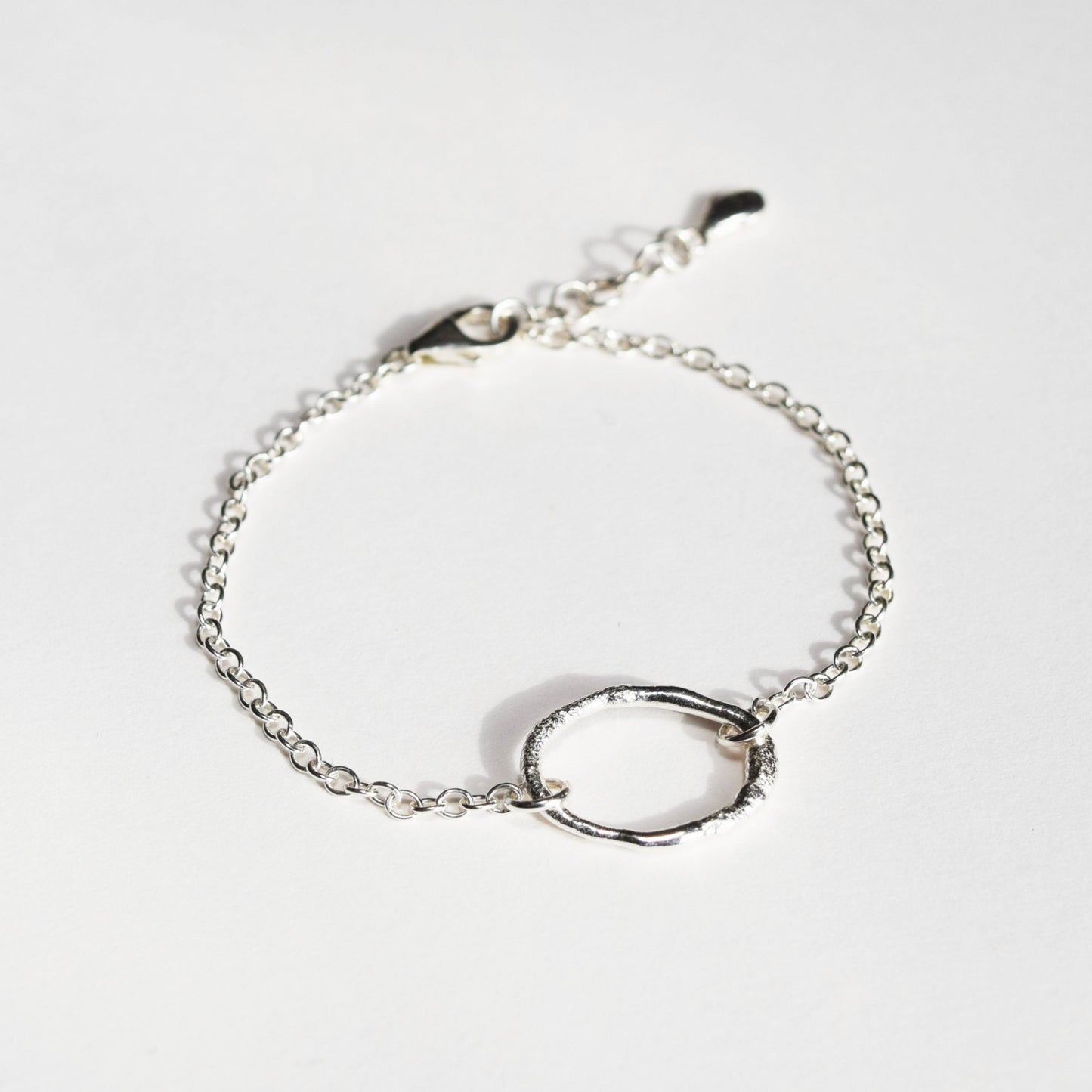 molten oval bracelet on white background