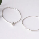 Handmade silver hoop earrings by MUKA studio 