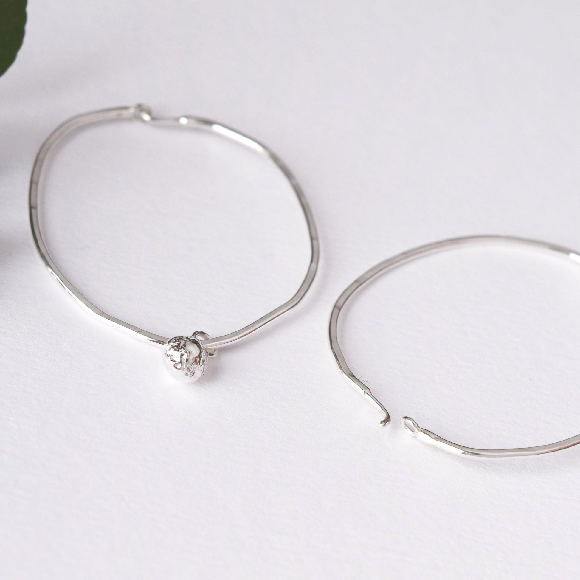 Handmade silver hoop earrings by MUKA studio 