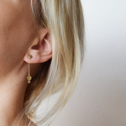 mid length Ella earrings in 9ct gold on blond model