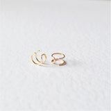 product image of double helix cuffs rose gold and gold