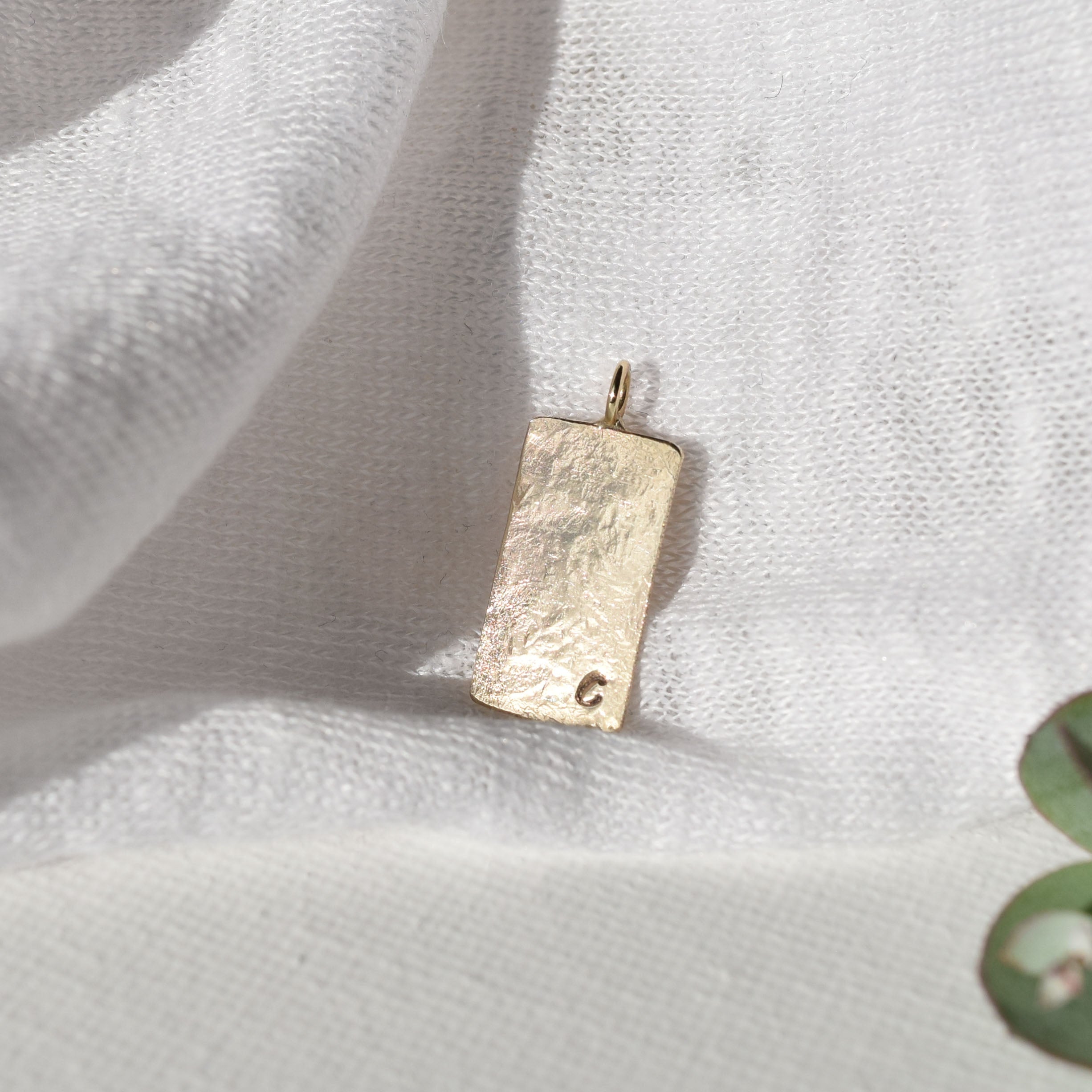 gold pendant personalised with letter C