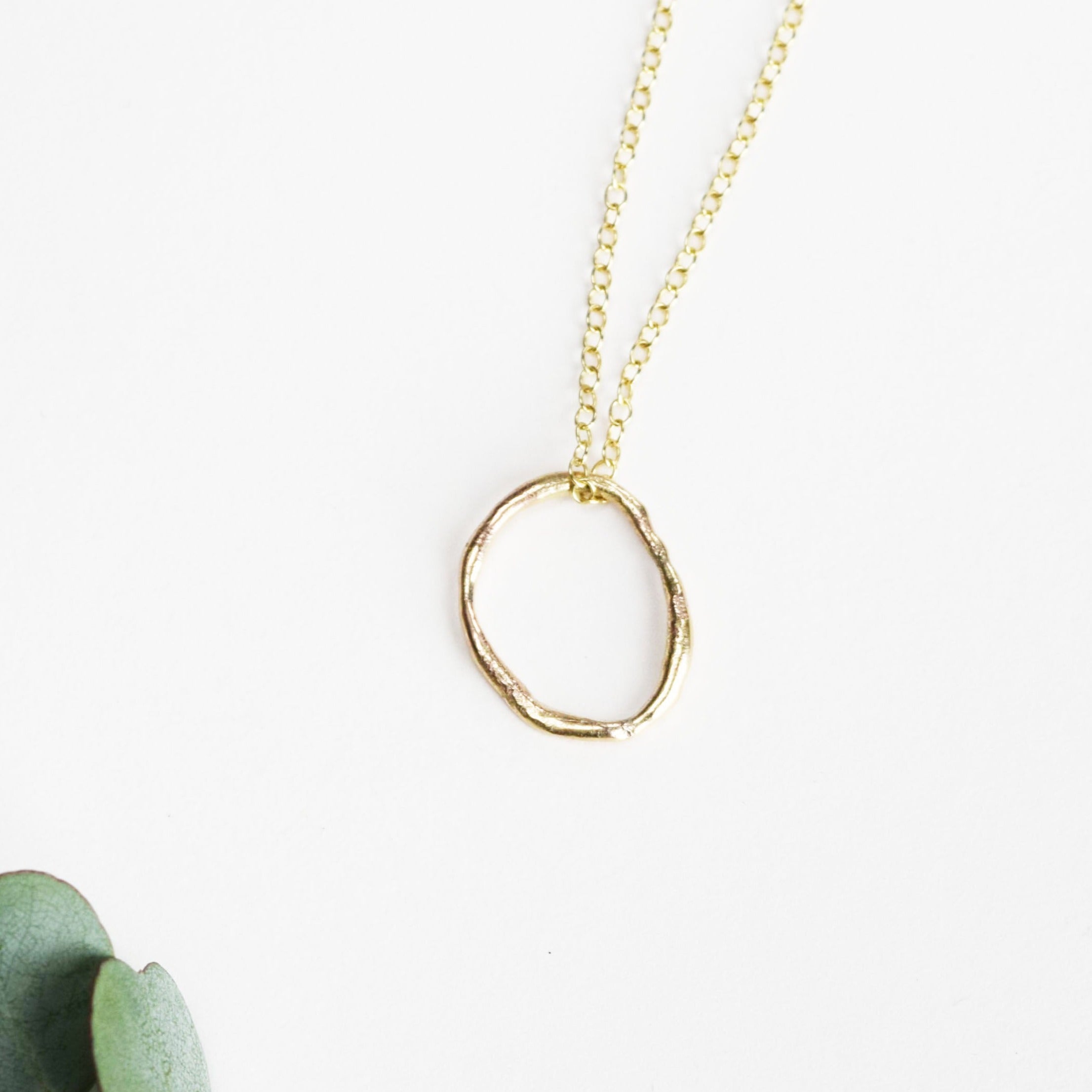 Recycled gold molten oval pendant uk