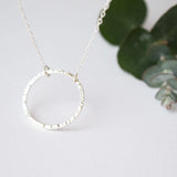 Hammered silver circle necklace created in recycled silver, handmade in Scotland, UK