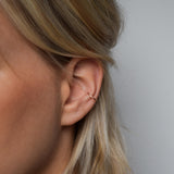 Hammered rose gold ear cuff on model