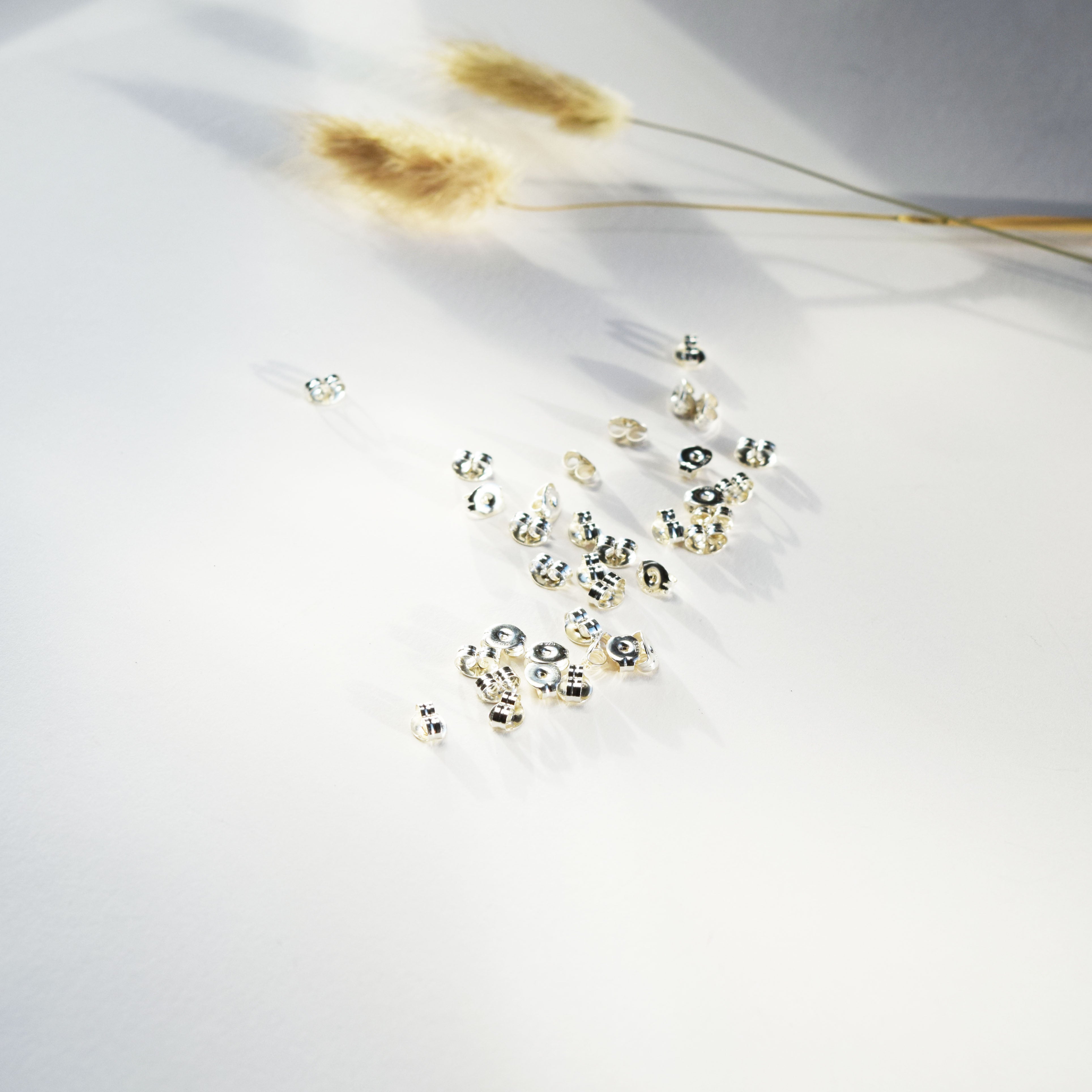 Silver butterfly earring backs