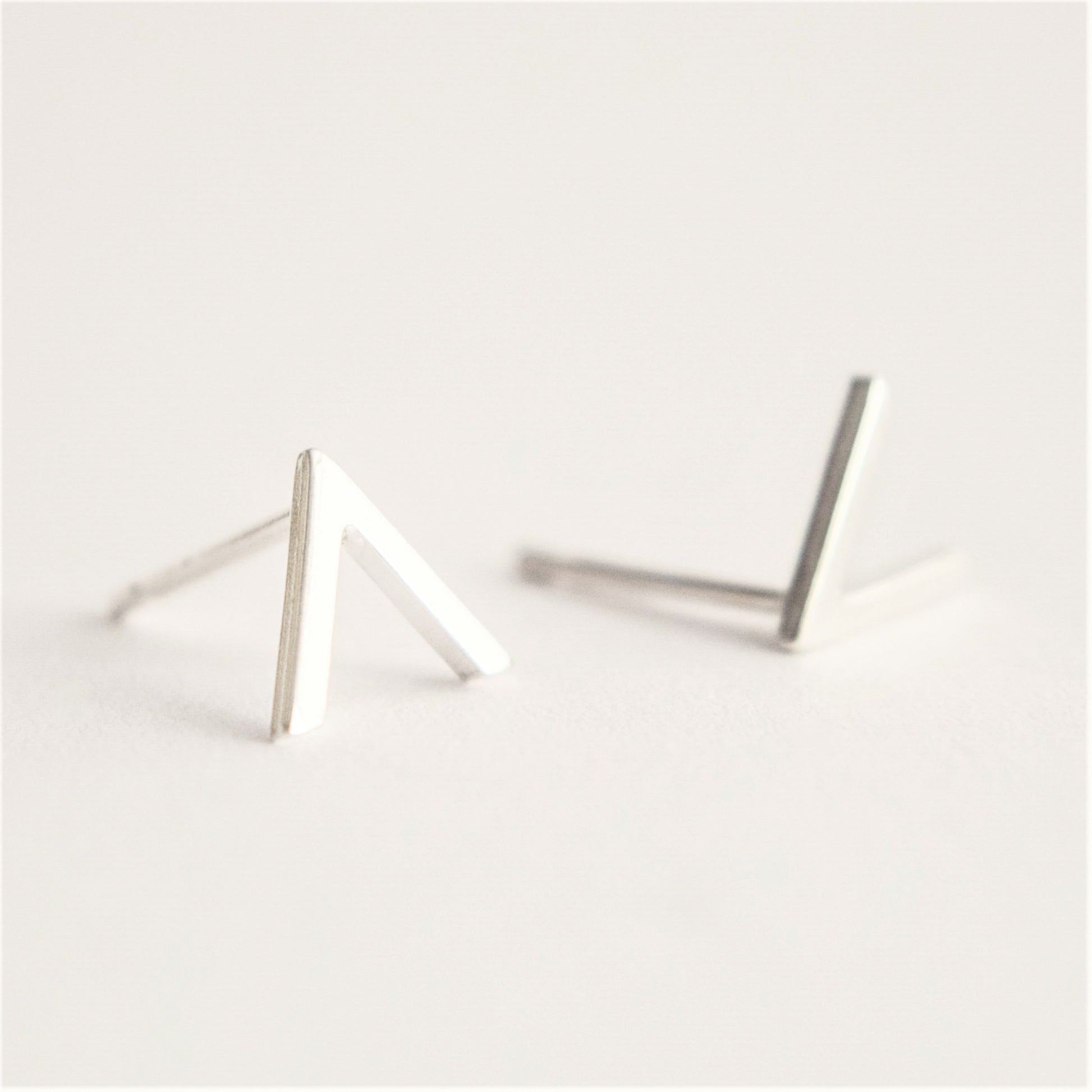 product image of chevron stud earrings on a white background