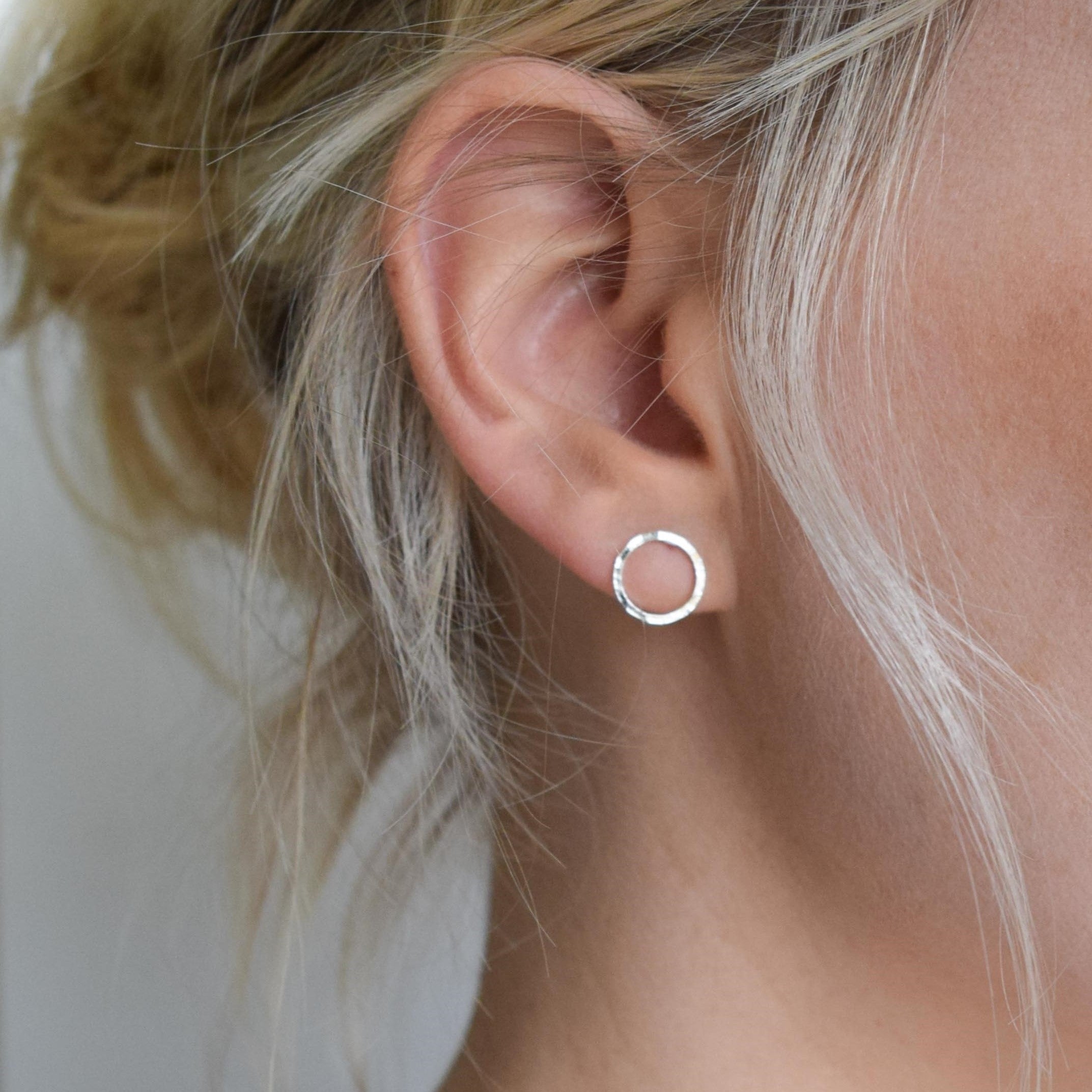 dimple circle stud on blond model