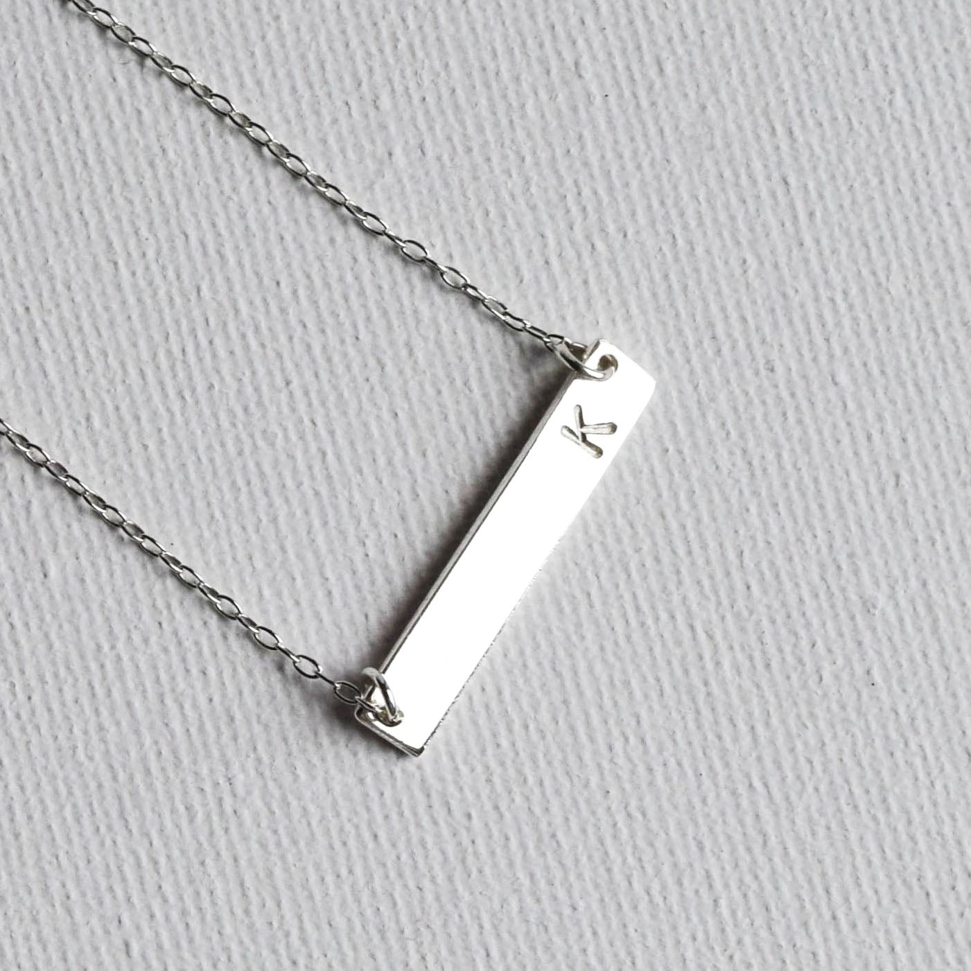 product image of bar necklaces personalised with letter K
